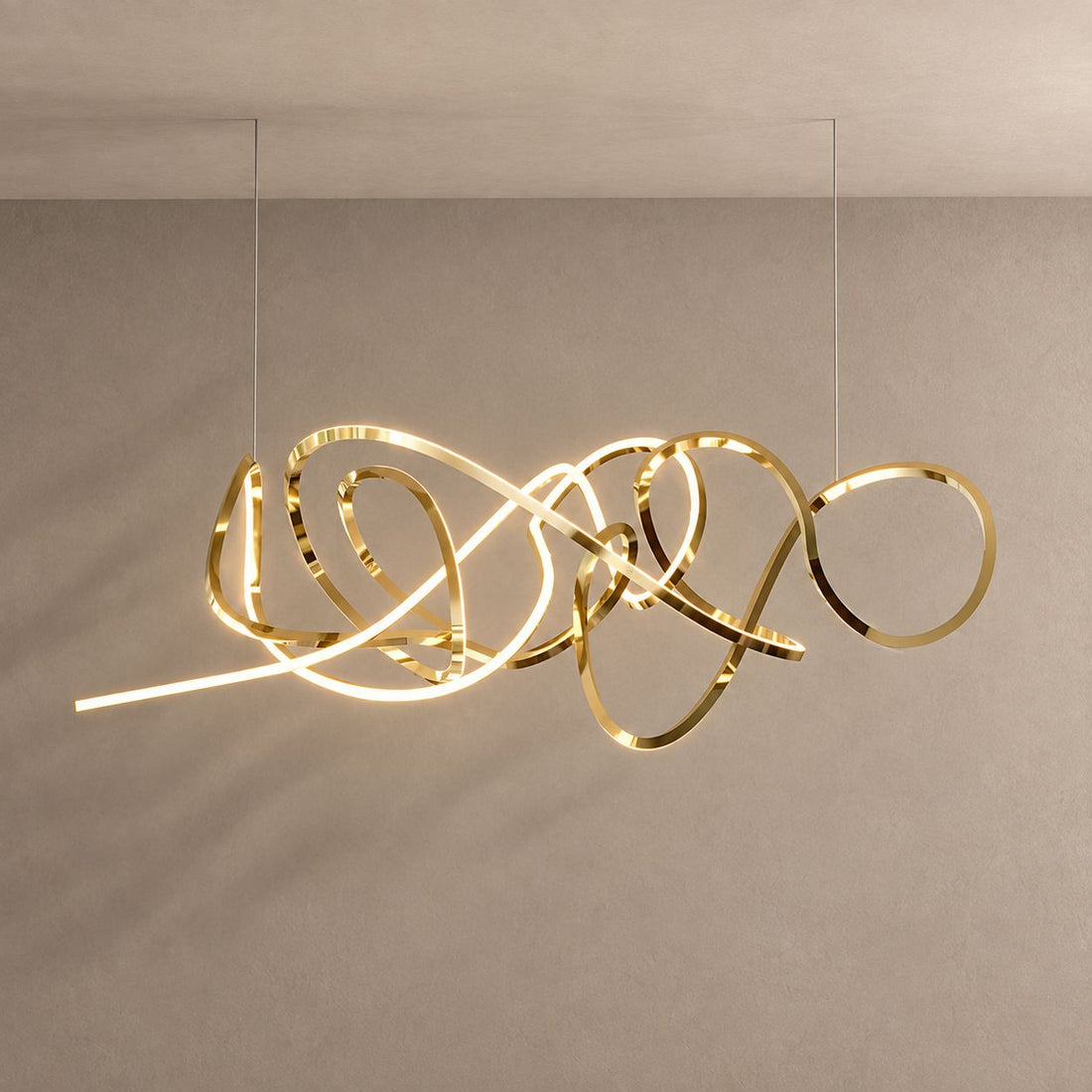 SWIRL chandelier on mushroom taupe with soft natural shadows