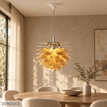 SYLUNE gold pinecone chandelier with layered metal petals and white canopy above an oak dining table