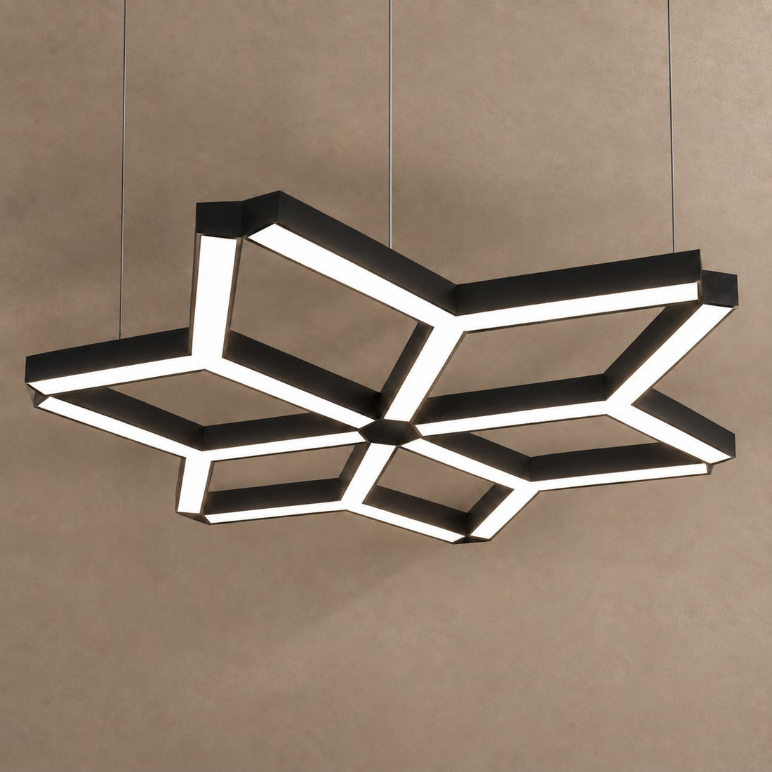 TESSERA on mushroom taupe background with natural shadows