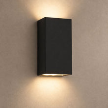 VEXOR lighting on a mushroom taupe background with natural shadows