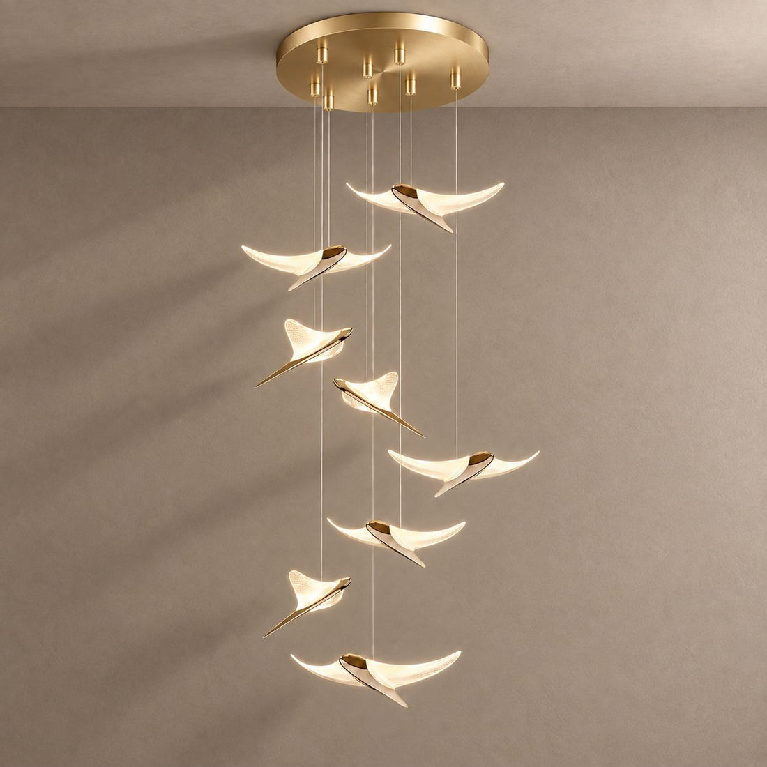 VOLANS lighting with natural shadows against a mushroom taupe background