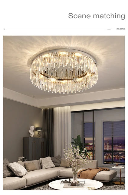 AMELIA round crystal ceiling light, lit, in a living room with sofa and city view