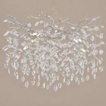 Round Crystal Branch Chandelier chrome on a mushroom taupe background