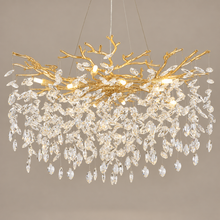 Round Crystal Branch Chandelier gold on a mushroom taupe background